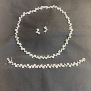 sterling silver and cubic zirconium necklace bracelet and earrings